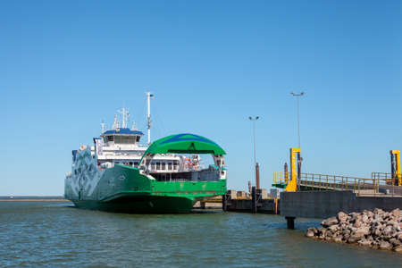 Rohukula, Estonia - MAY 29, 2020: A "Leiger" ferry-boat began to near the shore.のeditorial素材