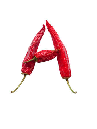 Letter A of the alphabet made with red pepper, isolated on a white background