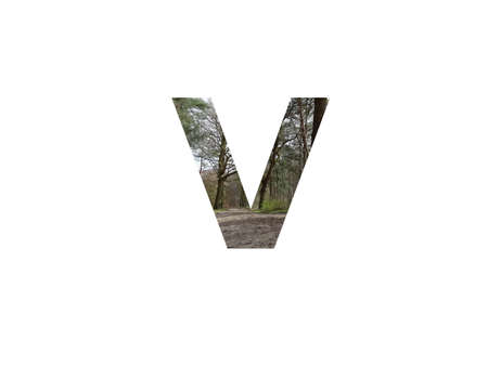 letter V of the alphabet made with a sand path in the forest, with the colors green, yellow, and white, isolated on white backgroundの写真素材