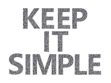 Keep it simple. Text made with letters of gray gravel isolated on a white backgroundの写真素材