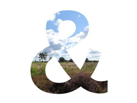And sign of the alphabet made with landscape with cloud, blue sky, trees, sun, grass and moorland....