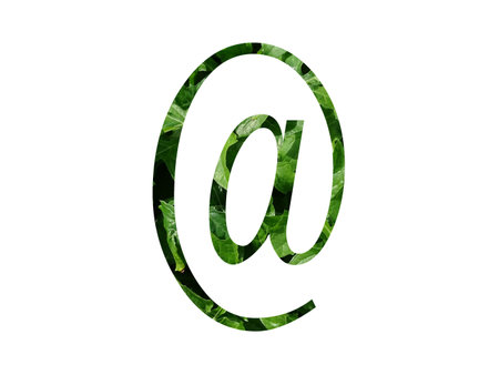 Mail sign, at sign of the alphabet made with fresh green leaf, isolated on a white backgroundの写真素材
