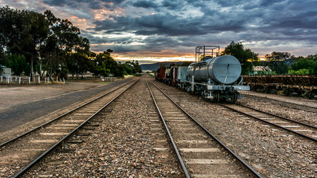 Pichi Richi Railway, Quorn - a heritage train sits on the tracks of the railway that travels through the foothills of the Flinders Ranges at sunset.のeditorial素材
