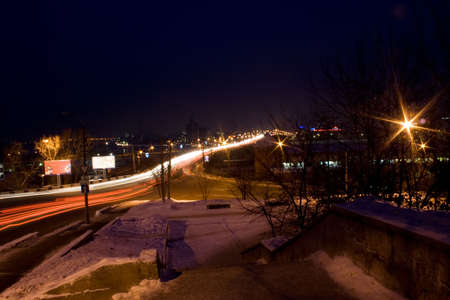 The night city (bridge over river Angara in Irkutsk)の写真素材