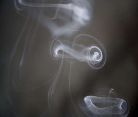 puff of aroma smoke on a dark backgroundの写真素材