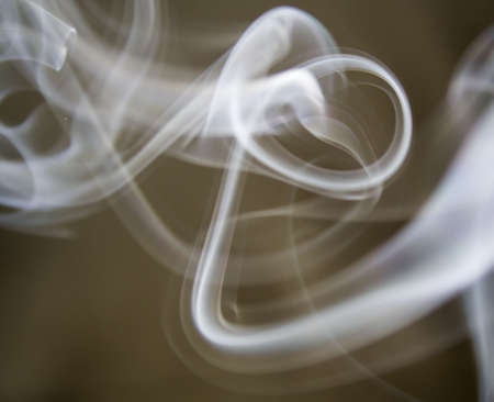 puff of aroma smoke on a dark backgroundの写真素材