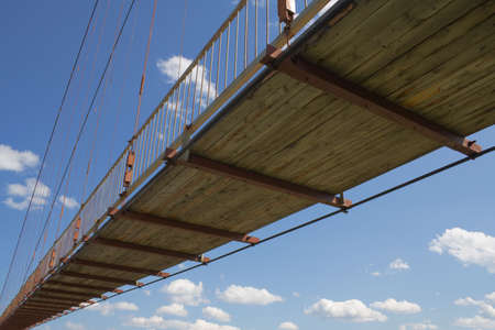 pendant footbridge over river Irkutの写真素材
