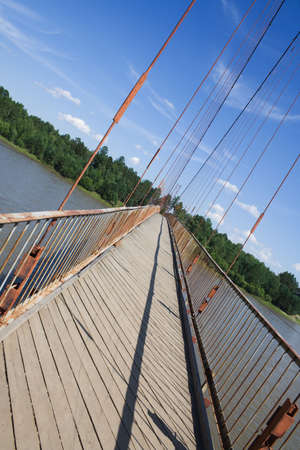 pendant footbridge over river Irkutの写真素材