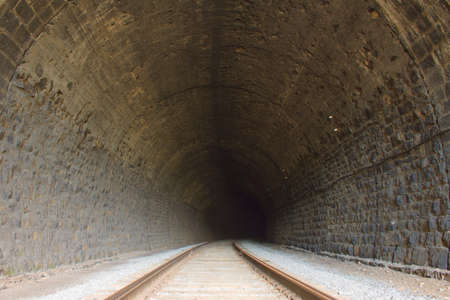 Fine railroad tunnel of the Circum-Baikal Road, the historical part of Trans-Siberian railway, near Lake Baikal, Russia.In total, part of the railroad from source of Angara river to the south end of the lake Baikal (80 km) contains 38 tunnels.の写真素材