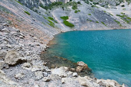 Imotski Blue Lake in Limestone Crater near Split, Croatiaの写真素材
