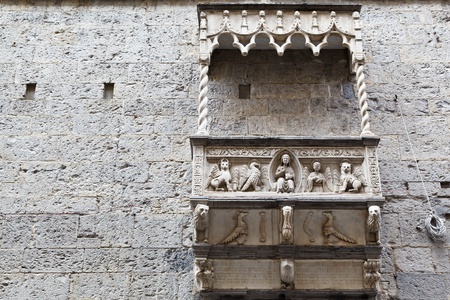 Building with Marble Balcony and Relief in Genoa, Italyの写真素材