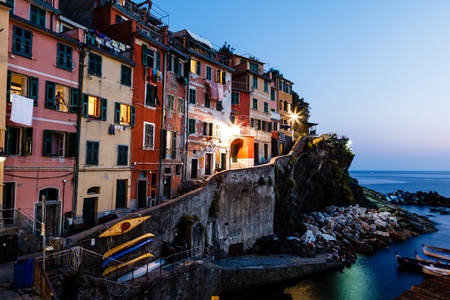 Village of Riomaggiore in Cinque Terre Illuminated at Night, Italyの写真素材