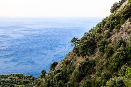 The Wild and Rocky Coast near Village of Vernazza in Cinque Terre, Italyの写真素材