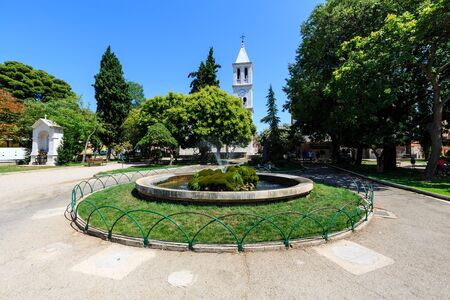 Fountains with Live Turtles and Small Church in Sibenik, Croatiaの写真素材
