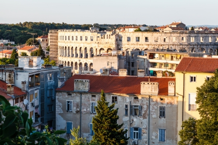 Aerial View on Ancient Roman Amphitheater and City of Pula, Croatiaの写真素材