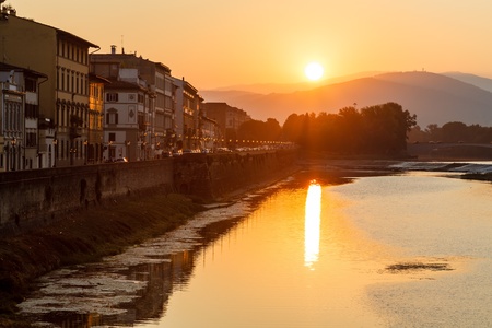 Sunrise at Arno River Embankment in Florence, Tuscany, Italyの写真素材