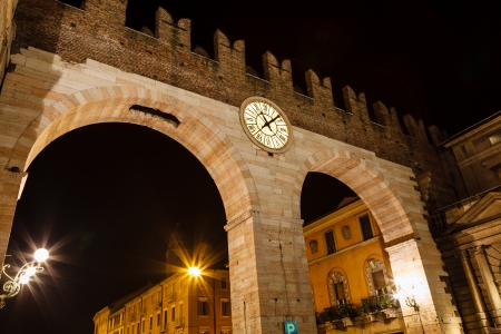 Medieval Gates in the Wall to Piazza Bra in Verona at Night, Veneto, Italyの写真素材