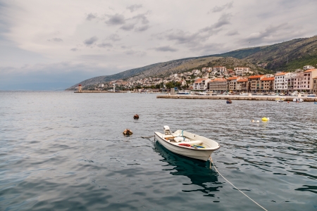 Boat and Coastline of Town Senj near Istria, Croatiaの写真素材