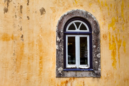 Arched Window on Yellow Wall of Pena Palace, Sintra, Portugalの写真素材