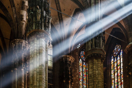 The Bright Beam of Light Inside Milan Cathedral, Italyのeditorial素材