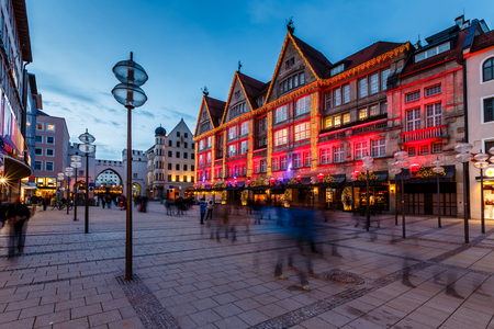 Illuminated Neuhauser Street and Karlsplatz Gate in Munich at the Evening, Germanyの写真素材
