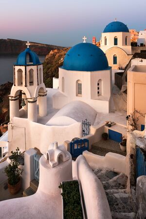 Saint Spyridon Church and Anastasis Church in the Morning, Oia, Santorini, Greeceの写真素材