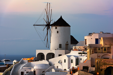 Windmills of Oia Village at Sunset, Santorini, Greeceの写真素材