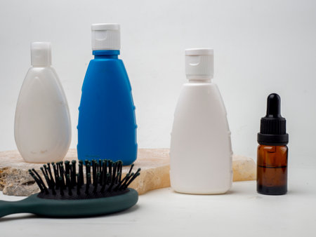 cosmetic bottles and brush for hair care on a white background.
blue and white hair beauty shampoo with natural ingredients.の写真素材