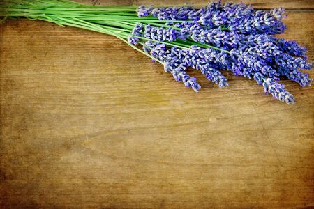 Lavender on a  rustic wooden background with copyspaceの写真素材