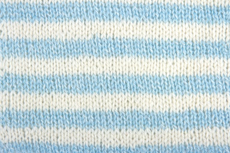 White and light blue striped knitting backgroundの写真素材