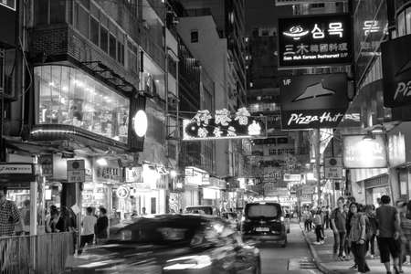 Tsim Sha Tsui, Hong Kong - 07 November, 2018 : Neon lights on Tsim Sha Tsui street in Hong Kong. Tsim Sha Tsui street is a very popular shopping place in Hong Kong.のeditorial素材