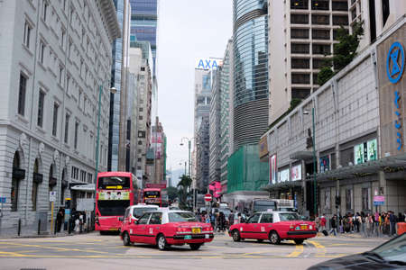 Hong Kong, China - 13 December 2018 : Street photography of people and vehicles on Nathan Road in...