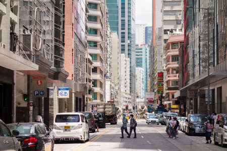 Kwun Tong, Hong Kong 22 May 2021: City view in Hong Kong, people walking on the streetのeditorial素材