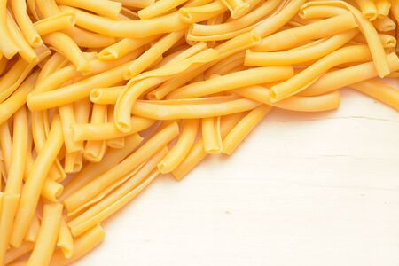 A group bucatini pasta  on wooden tableの写真素材