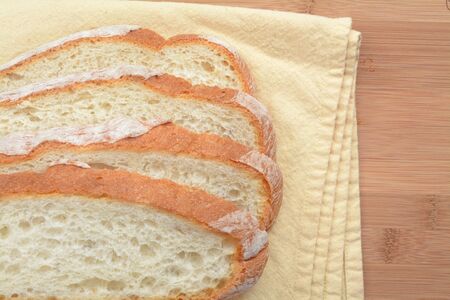 Slice bread on wooden table