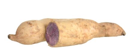 Two sweet potatoes on tableの写真素材