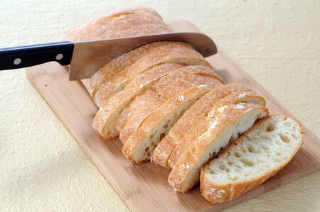 cutting flat bread with knife