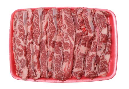 beef ribs in tray isolated on white background