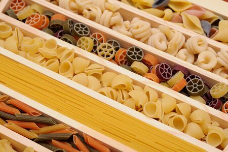 many kind of pasta: conchiglie, trottole, pipe, rigate, wheel, tube, spaghettiの写真素材