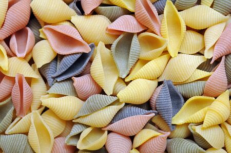 a lot of conchiglie gourmet pasta for background usesの写真素材