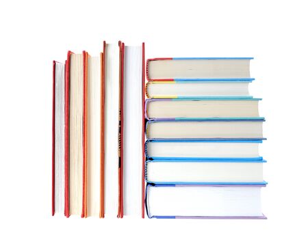 pile of colorful books isolated on white backgroundの写真素材