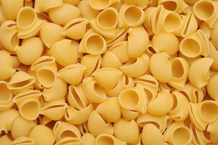 a lot of pipe rigate pasta for background uses