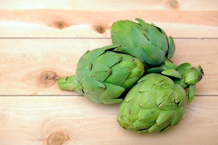 three of artichokes with copy space for designの写真素材