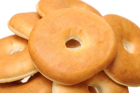 mini baked bagels isolated on white background