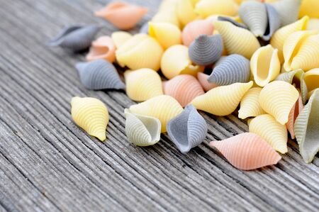 Conchiglie pasta on grungy  backgroundの写真素材