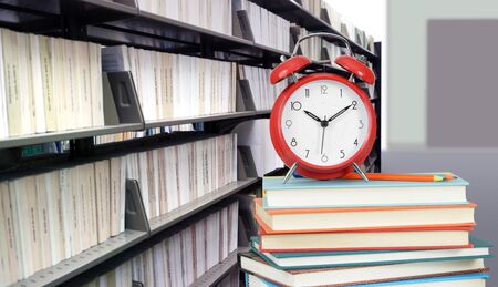 stack of books in library for education concept