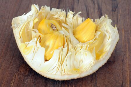 a portion of jackfruit on wooden table
