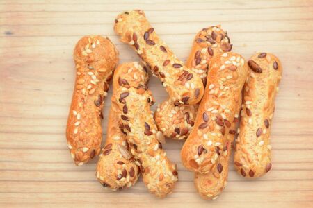 pretzel nuts on rustic wooden board for frame