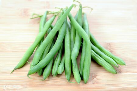  a group green bean  on cutting board の写真素材