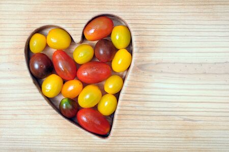 fresh colorful grape tomato for healthy heartの写真素材